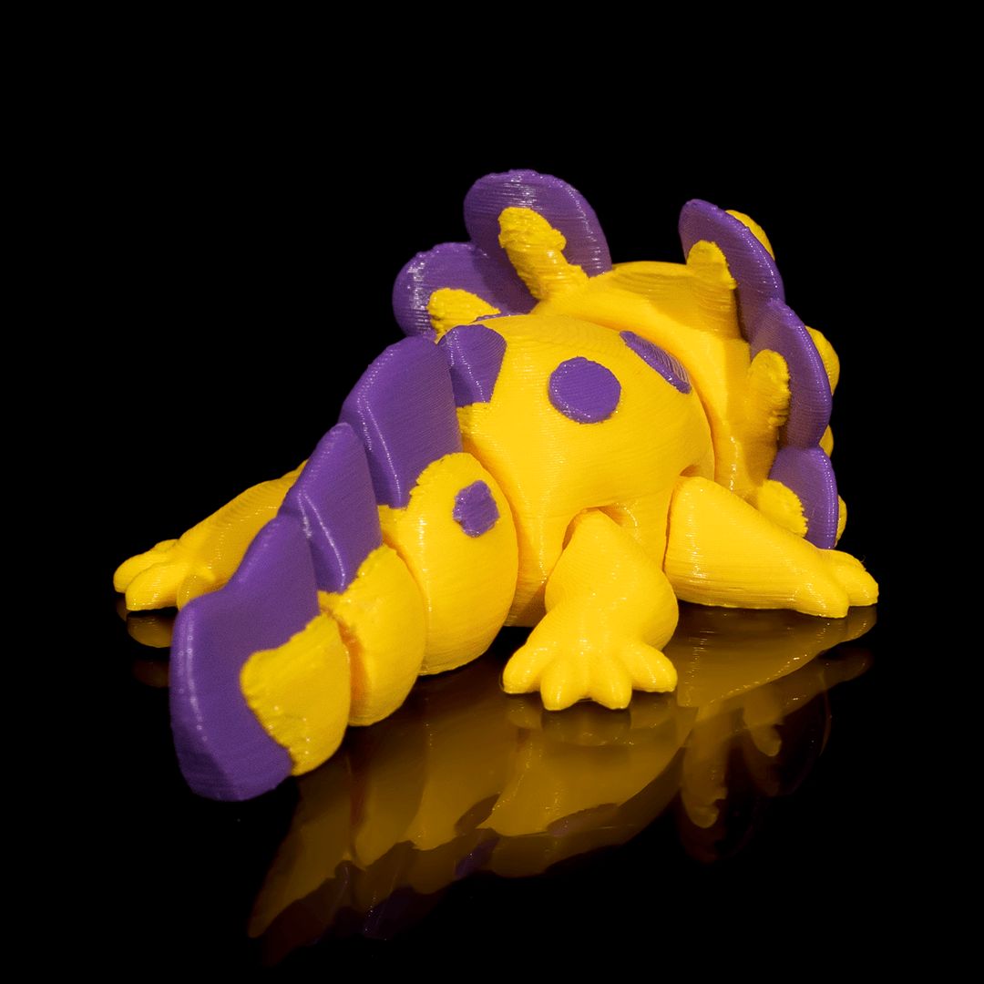 "Banana Cup Axolotl 3D-Figur mit fröhlichem, verspieltem Gesichtsausdruck, fruchtiger Spaßvogel und Mini-Genießer im 7g Miniformat"Gecko3d