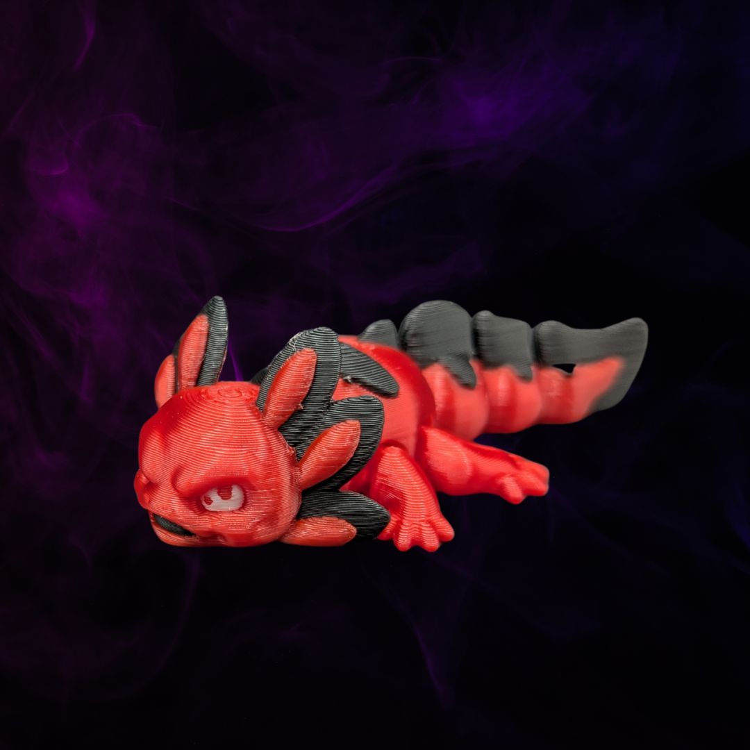 "Velvet Munchkin Axolotl 3D-Figur mit grummeligem Gesichtsausdruck, kleiner Brummbär im Miniformat mit charaktervollem Blick und weichem Kern" Gecko3d