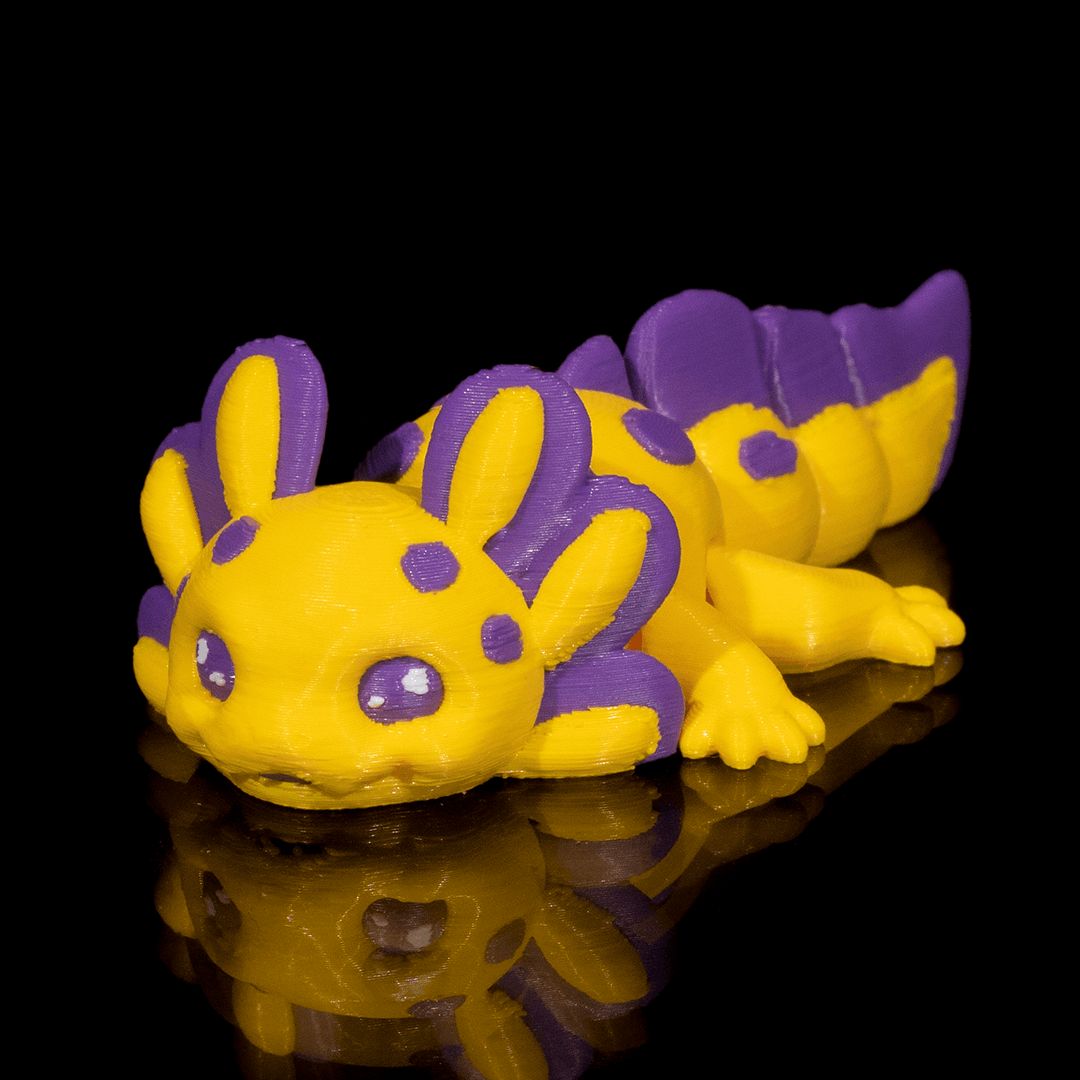 "Banana Cup Axolotl 3D-Figur mit fröhlichem, verspieltem Gesichtsausdruck, fruchtiger Spaßvogel und Mini-Genießer im 7g Miniformat"Gecko3d