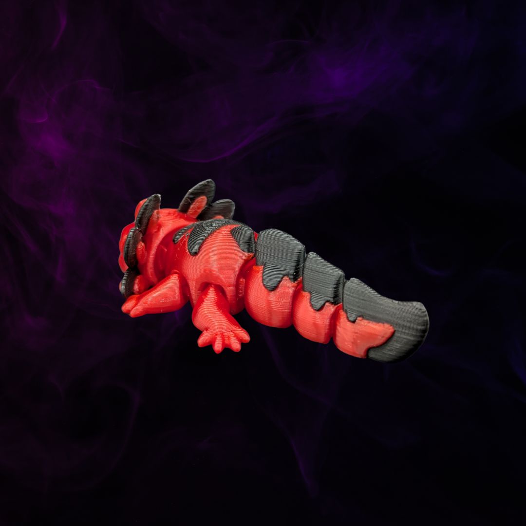 "Velvet Munchkin Axolotl 3D-Figur mit grummeligem Gesichtsausdruck, kleiner Brummbär im Miniformat mit charaktervollem Blick und weichem Kern" Gecko3d