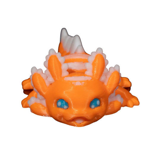 "Baby Candy Axolotl 3D-Figur in bonbonorange-weißer Farbgebung mit energiegeladenem Gesichtsausdruck, süßer Wirbelwind mit voll beweglichen Gelenken"Gecko3d