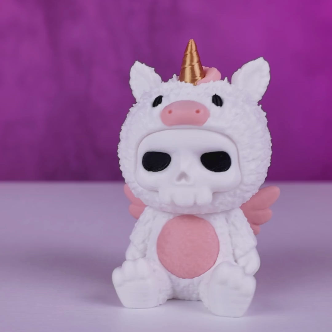 Unna Einhorn Skubbie Video - 360° Ansicht der magischen 3D Sammelfigur mit goldenem Horn und rosa Flügel-Details von Gecko3D als Taschenanhänger und Schlüsselanhänger