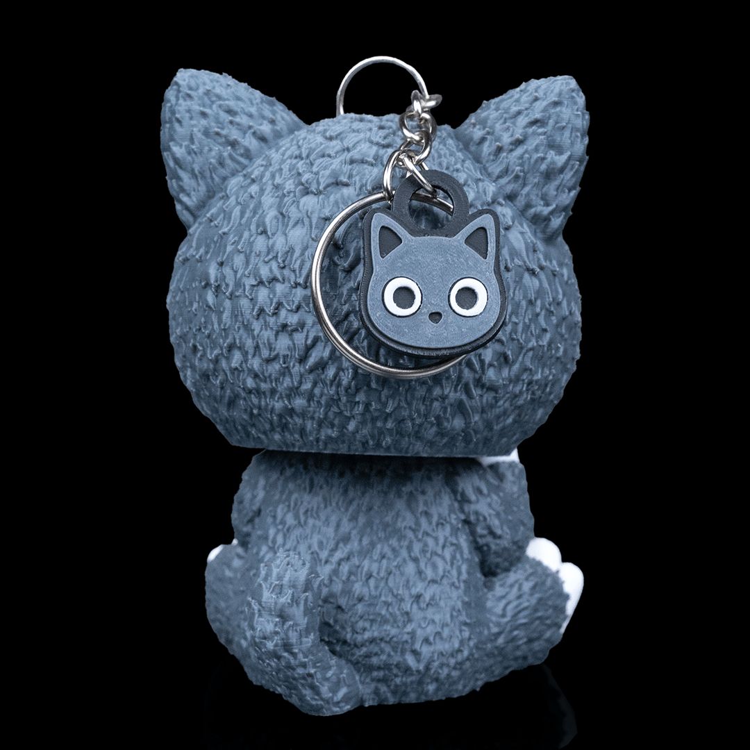 Whispurr Katzen Skubbie - Entspannte 3D Sammelfigur mit halb geschlossenen Augen aus nachhaltigem PLA als Deko oder Taschenanhänger von Gecko3D